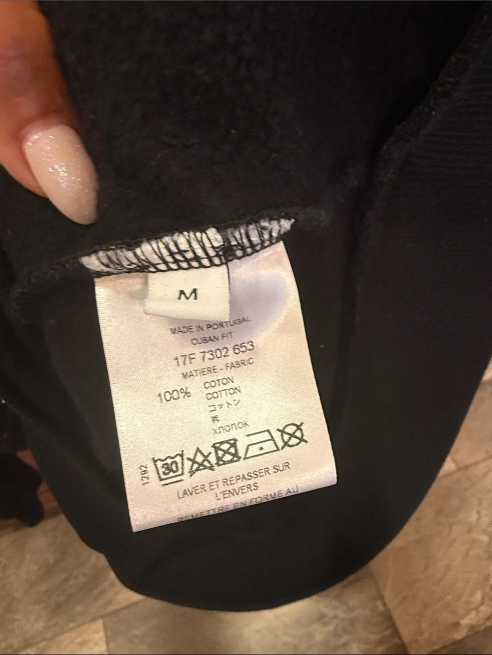 Givenchy Black Crewneck Sweater with White Star Circle and Red-Striped Sleeve